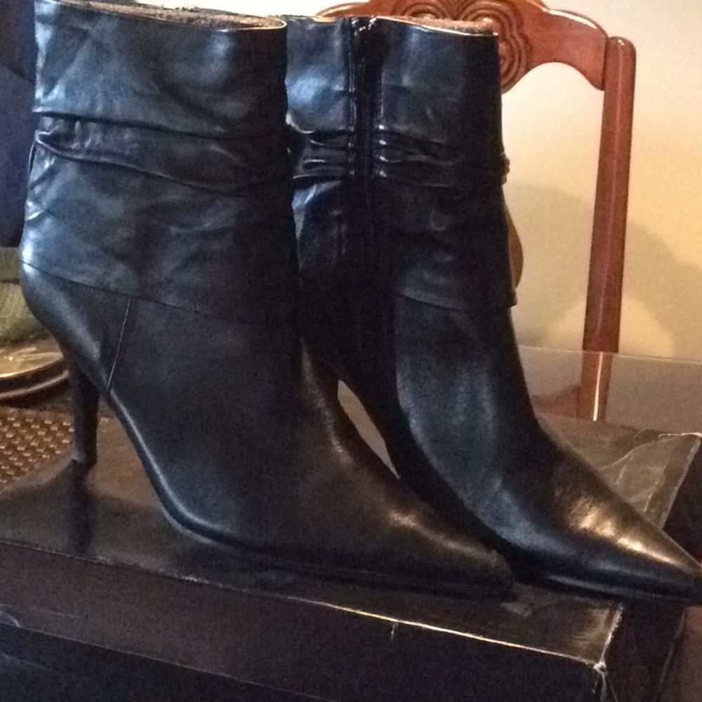 Carlos Santana boots hung up
